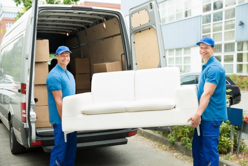 Boxes and household items representing Oldmalden storage in a practical space solution