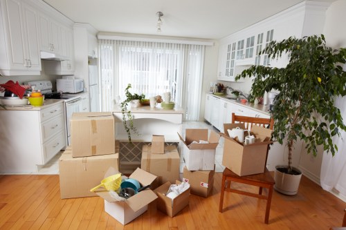 Large furniture and appliances being handled during an Old Malden home move