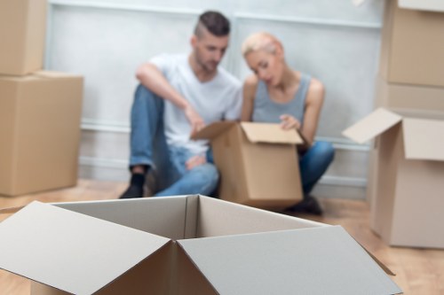 Packed storage boxes and wrapped furniture prepared for long-term storage in Oldmalden