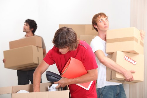 Local Oldmalden man and van loaded with moving boxes