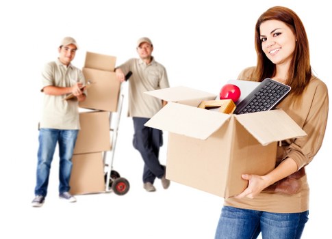 Oldmalden home move with removal team loading a van outside a suburban property